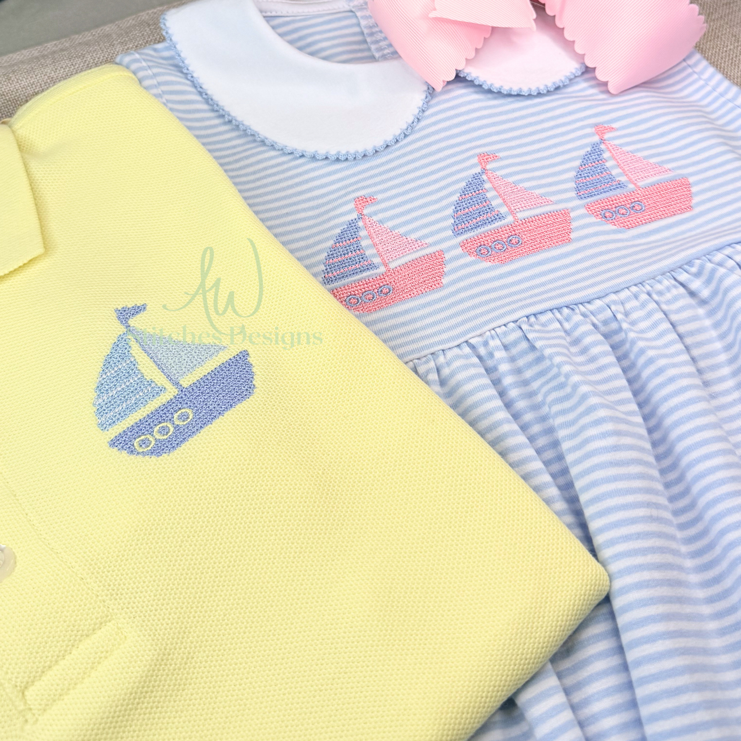 Children's clothing with sailboat designs on a soft background