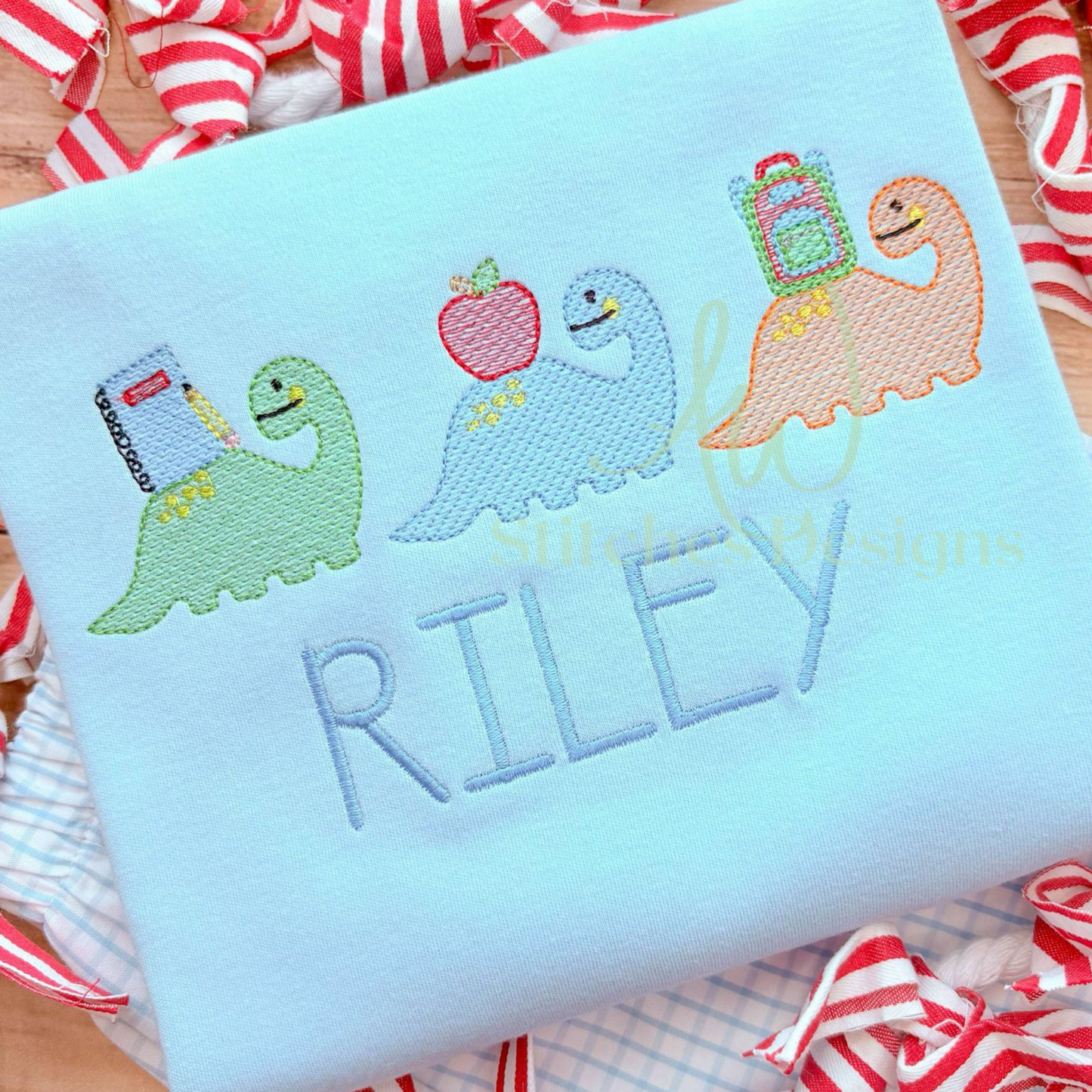 Detailed view of Back to School Dinosaur Trio Embroidery design