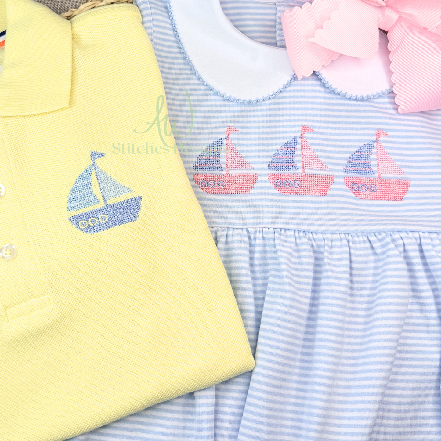 Yellow and blue dress with sailboat design next to a blue and pink striped dress with sailboat design.