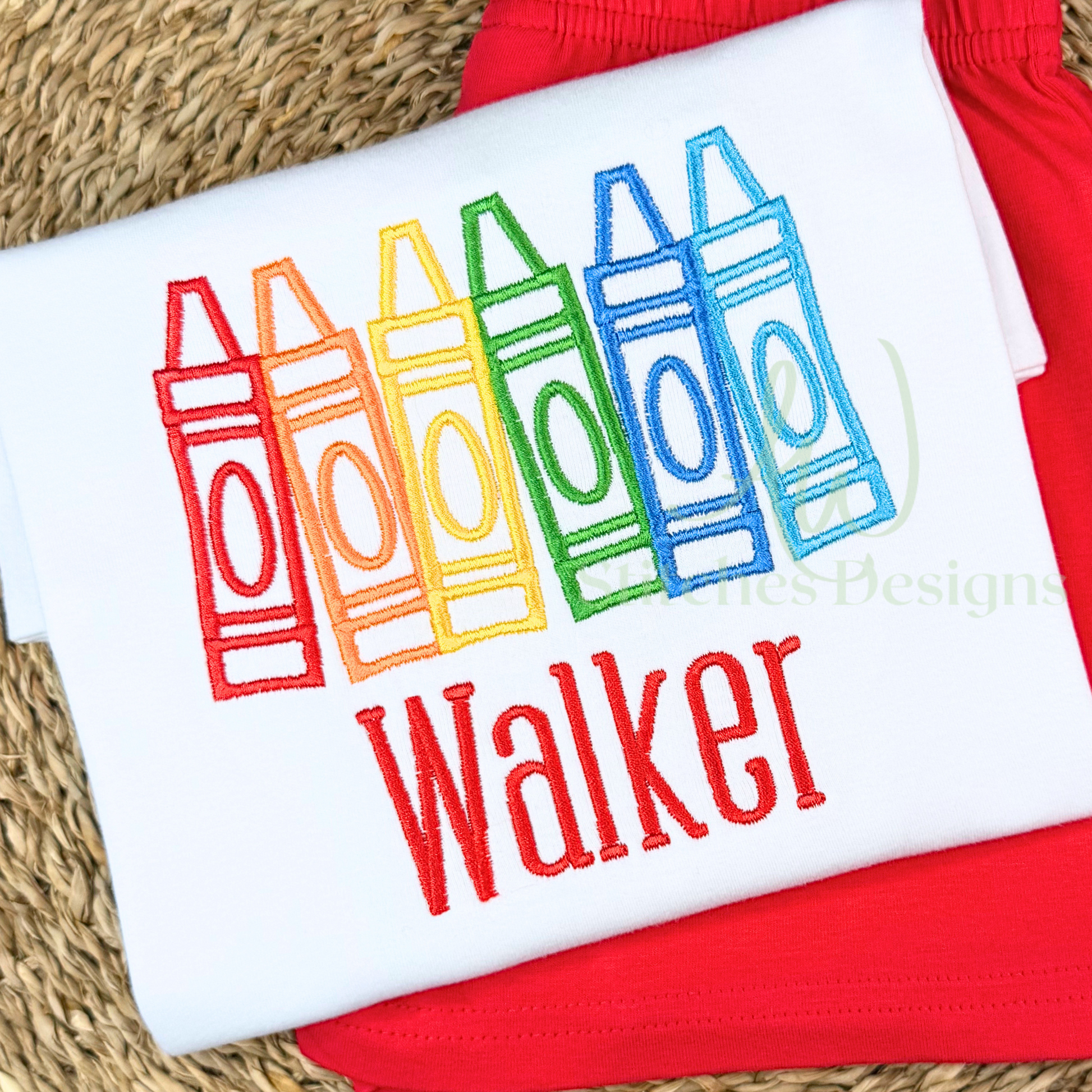 White shirt with colorful crayon design and 'Walker' text on a red background