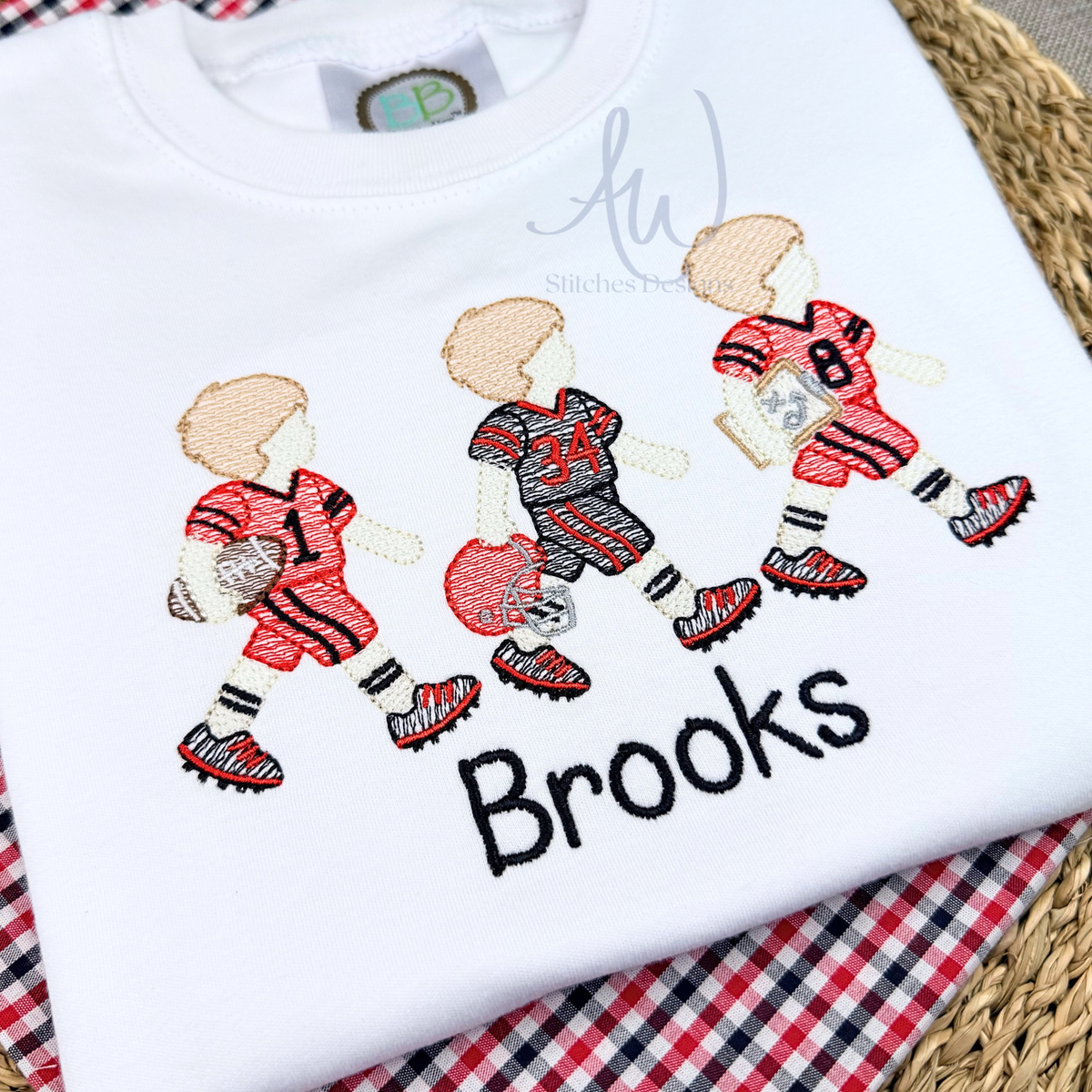 Football player trio embroidery design in blue and white game day uniforms