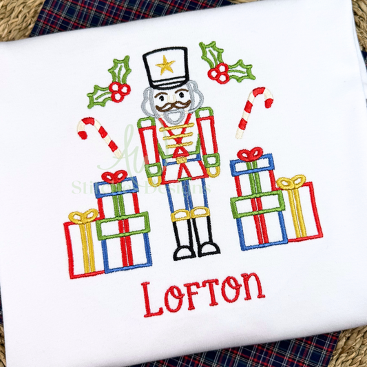 Nutcracker with Christmas presents satin stitch machine embroidery design file