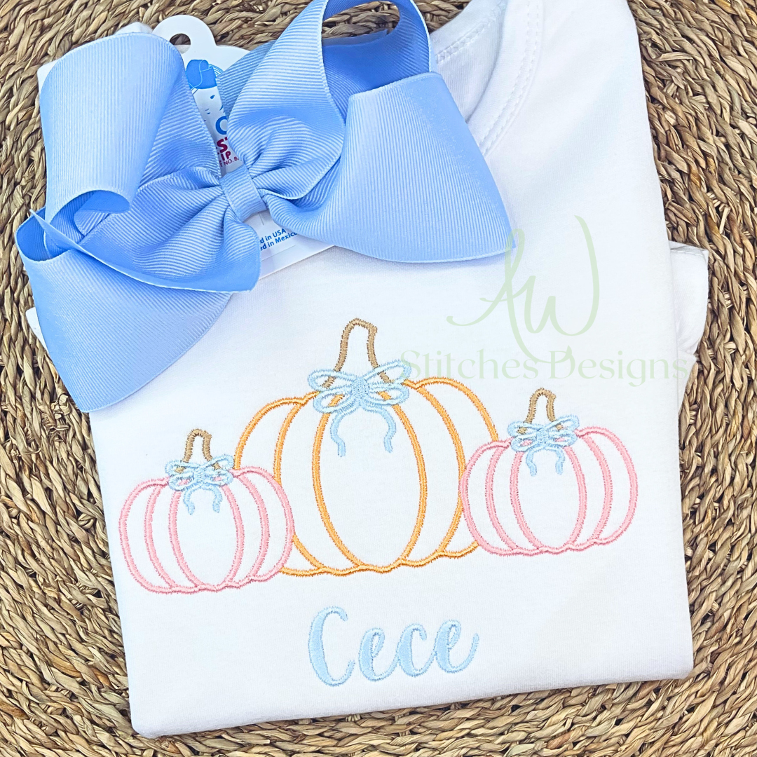 Pumpkin trio with bow satin stitch